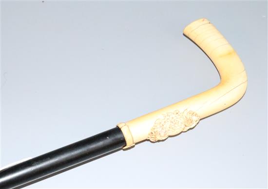 Carved ivory handled walking stick